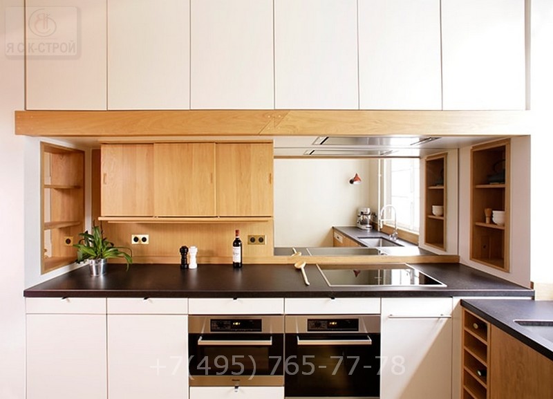 Кухня выполнена по дизайну и интерьера кухонь
